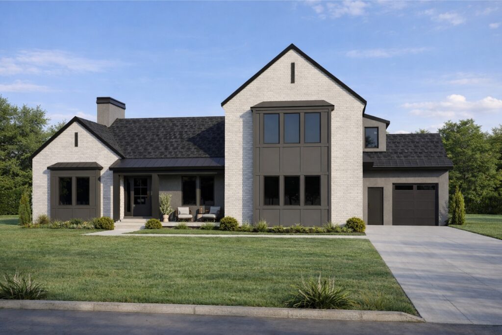 A house with a white exterior and black roof is surrounded by trees and grass.