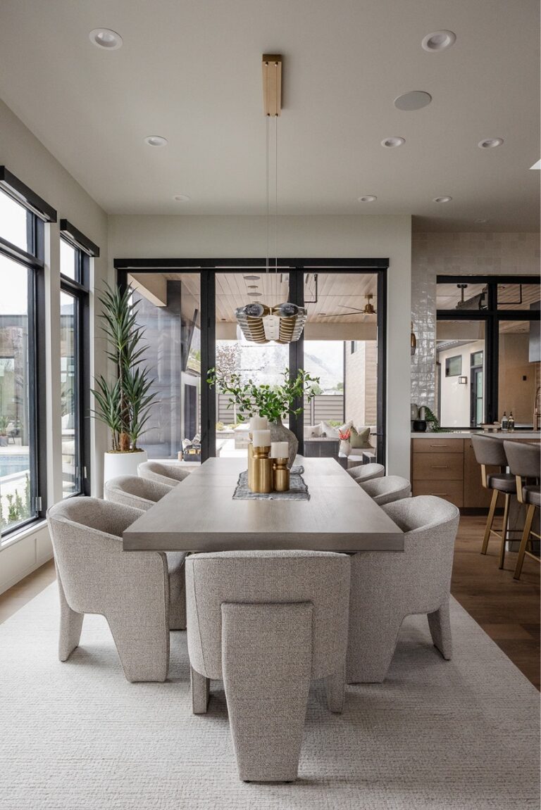 A white room with a dining table and chairs is shown through a filter effect.